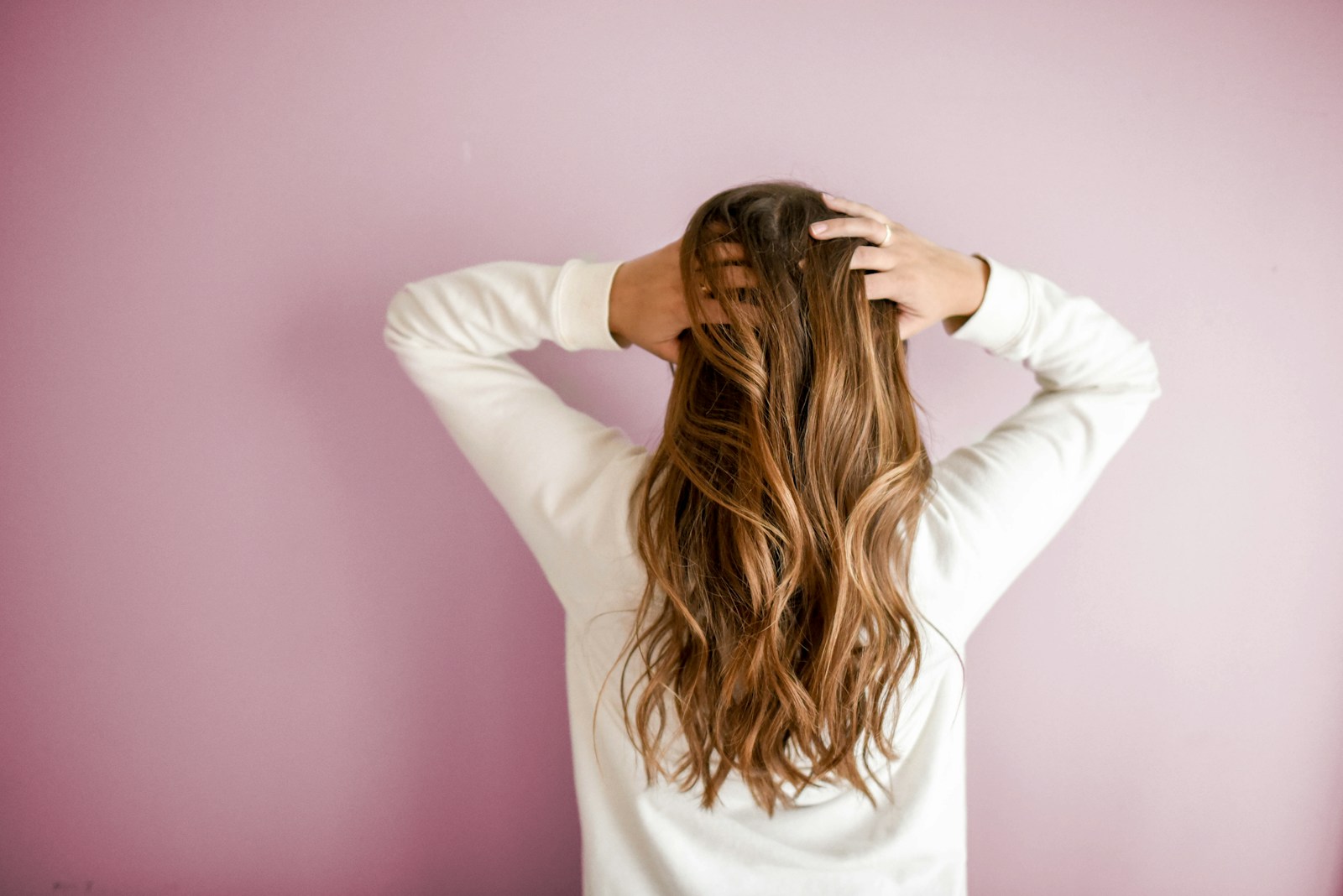 Stylist consulting with a client in a bright salon